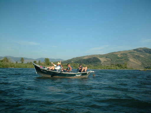 Dad rows a dory on a stretch of the Snake River behind the house!!!